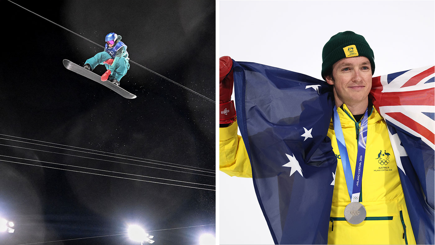 Scotty James holding up a US Flag